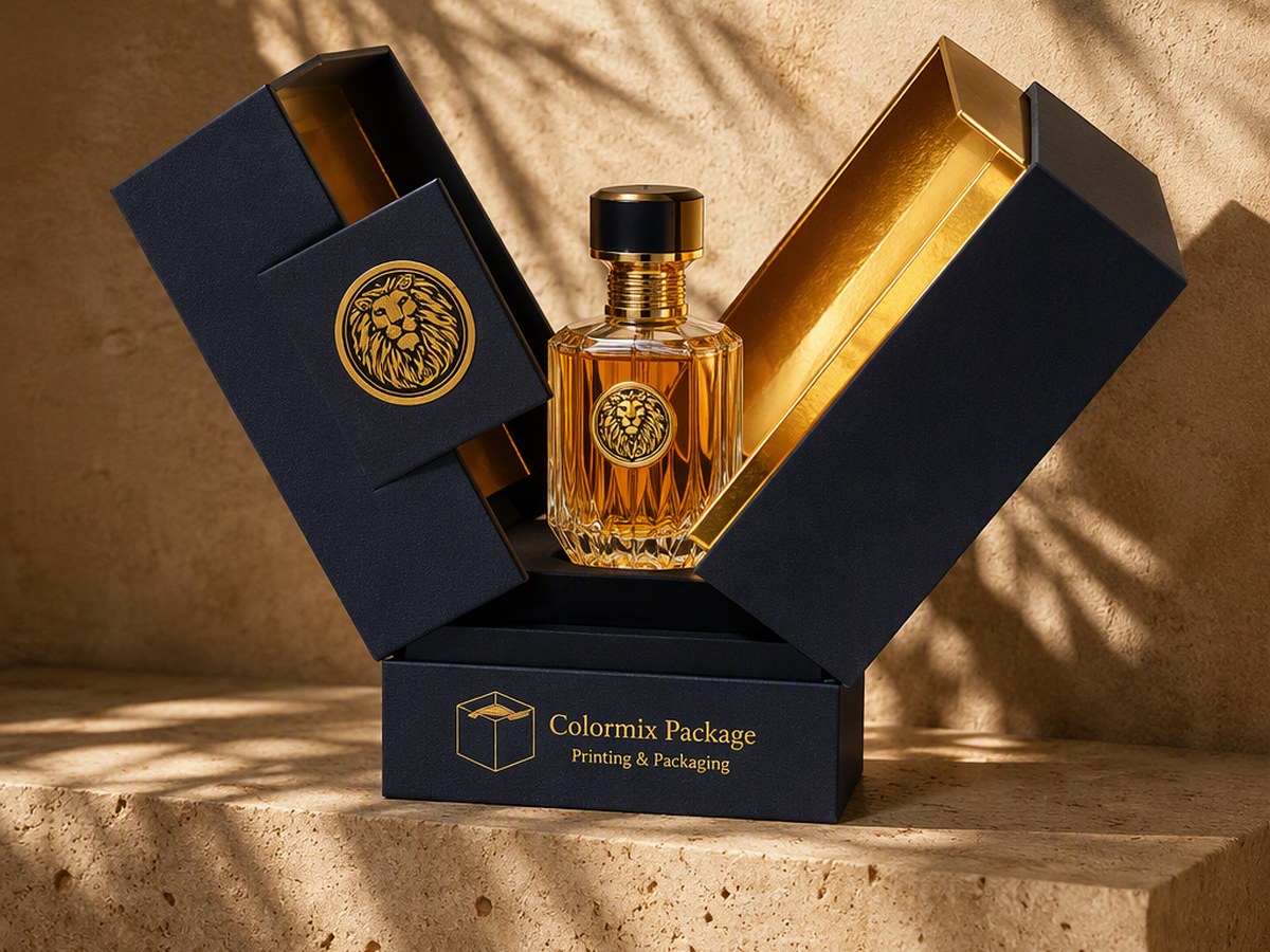 Navy double-door perfume box with a gold-lined interior holding a glass flacon, branded Colormix